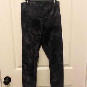 Black and light gray marbled Lululemon super soft leggings.